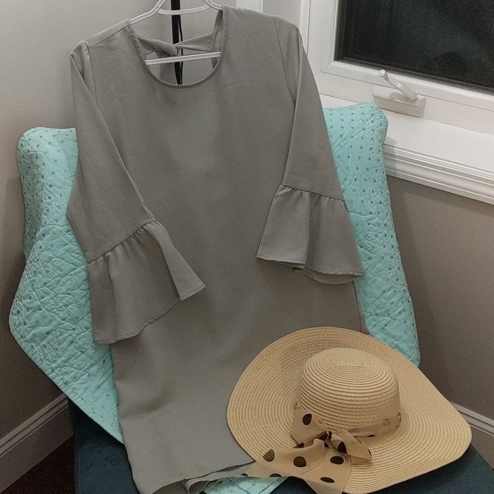 Dress with bell sleeves, tie neck in back